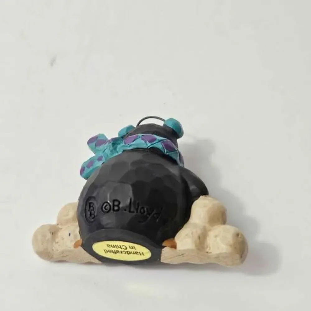 B. Lloyd Penguin Figurine 